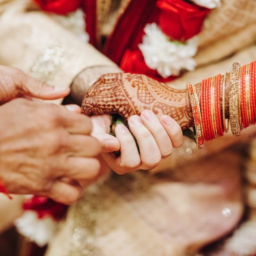 Ritual with coconut leaves during traditional Hindu wedding ceremony